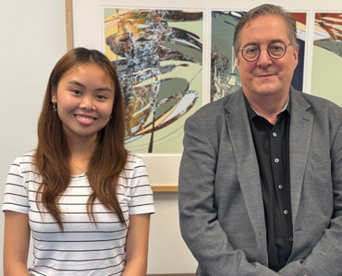 School of Computing student Hannah Le, left, with Greg Lavender.