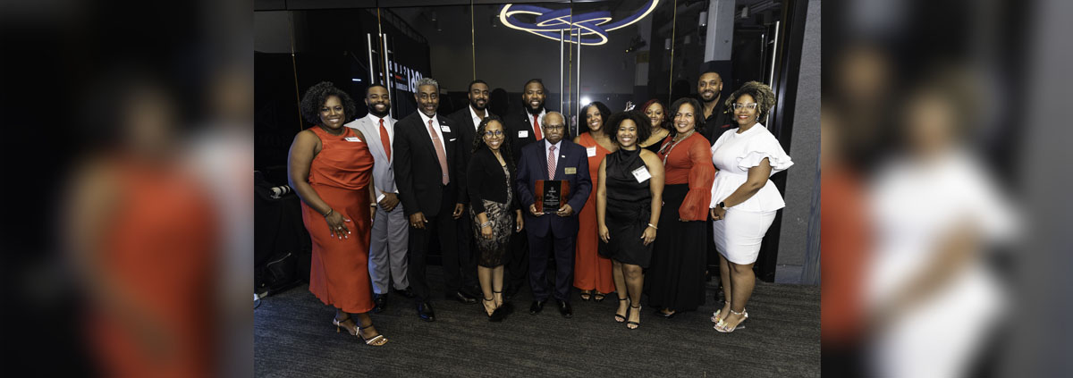 Group photo featuring the 2024 Footsteps Award recipient Justice Robert Benham at the 1961 Club Celebration.