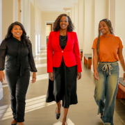 Mentor walks with mentees at the University of Georgia Terry College of Business.