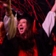 Streamers fall over the crowd during fall 2024 undergraduate commencement at Stegeman Coliseum. (PHOTO: Chamberlain Smith/UGA)