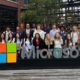 UGA Career Caravan students take photo in front of Microsoft sign