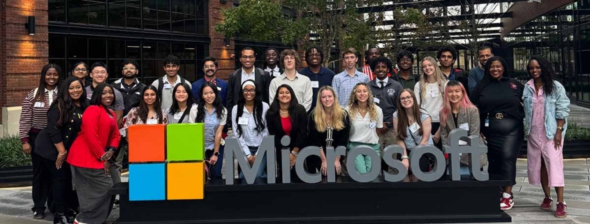 UGA Career Caravan students take photo in front of Microsoft sign