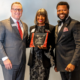 Jeremy Ransom, associate vice president for UGA development and alumni relations (left), and Corey Dortch, president of the UGA Alumni Association (right), presented the 2026 Footsteps Award to DeRetta Rhodes (center) at the annual 1961 Club Celebration in Atlanta in June. Photo credit: Cliff Robinson Photography.