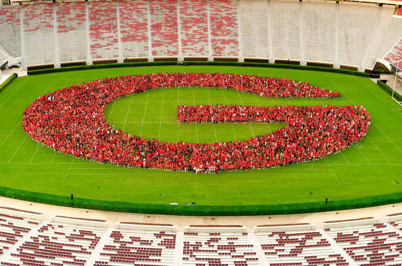 Photo of freshman welcome gathering into the Georgia G at Sanford Stadium.