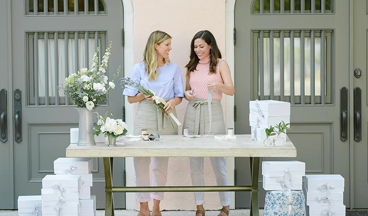 A Signature Welcome owners Lindsay Bissell Marko (BBA ’07) and Emily Howard Slater (BS’07).