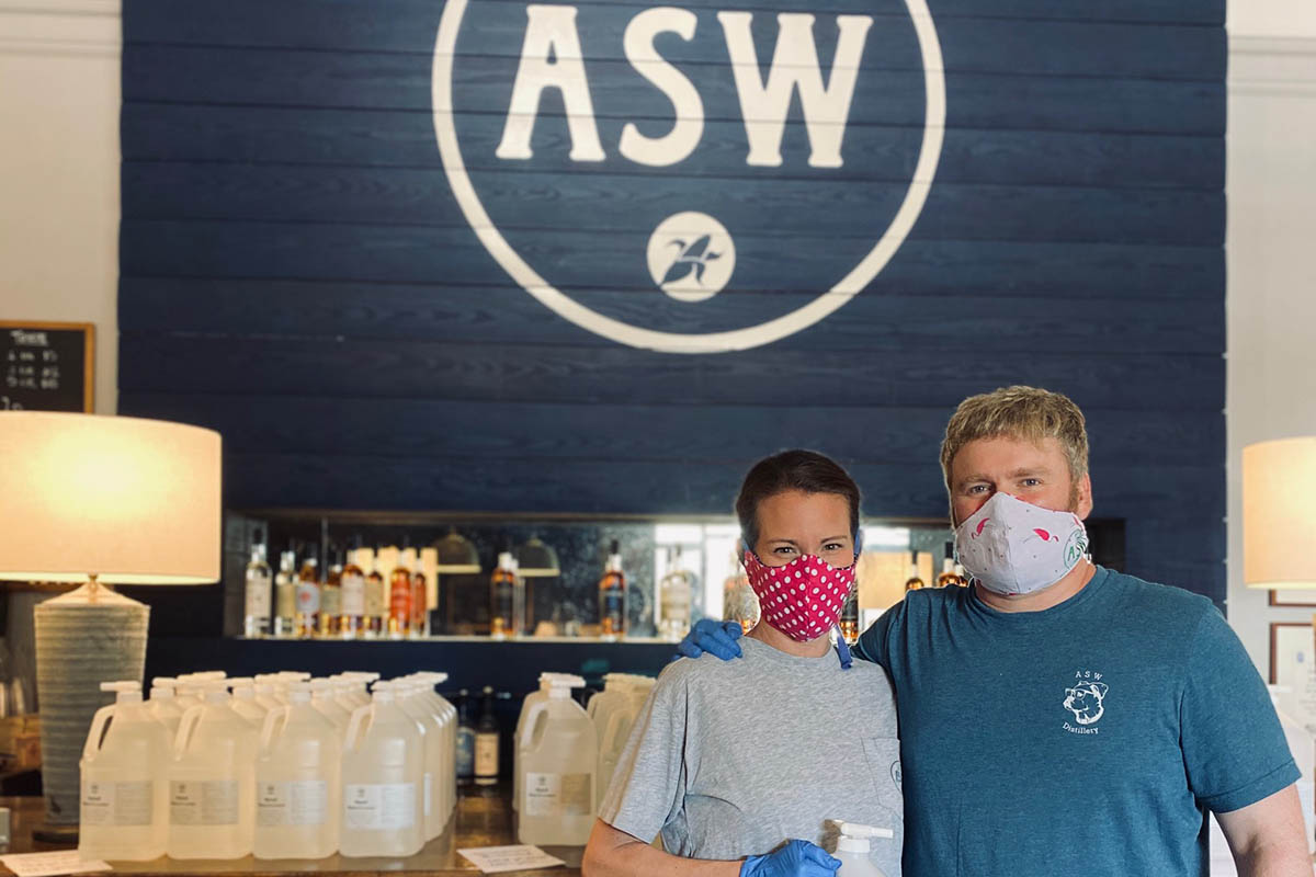 Kelly and Jim Chasteen with hand sanitizer produced at ASW Distillery. (photo provided by Jim Chasteen)