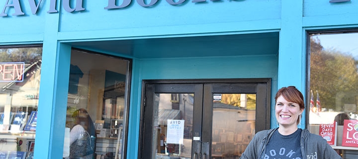 Janet Geddis (MED ’06) owner of Avid Bookshop stands in front of her store in Athens, GA