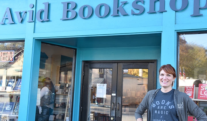 Janet Geddis (MED ’06) owner of Avid Bookshop stands in front of her store in Athens, GA