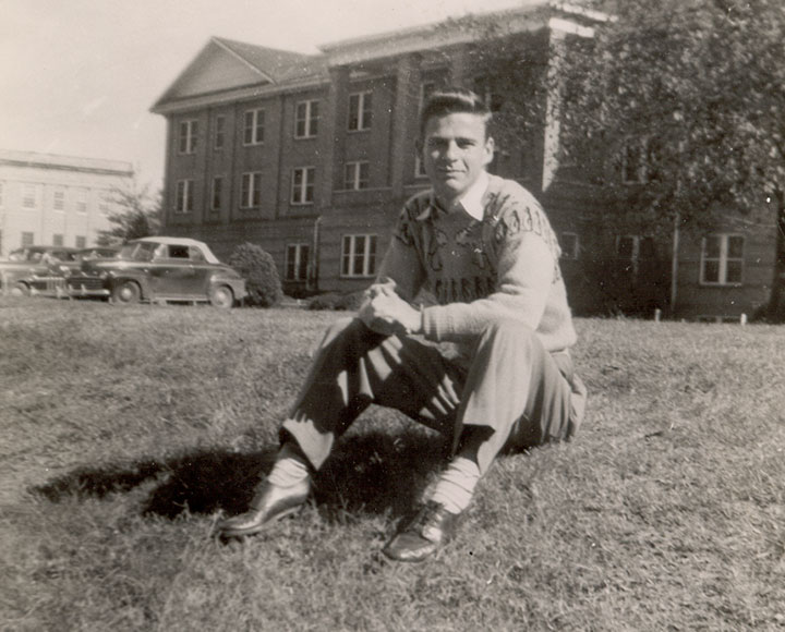 Glenn Lewis Taylor (BSED ’49) sitting in Myers Quad.