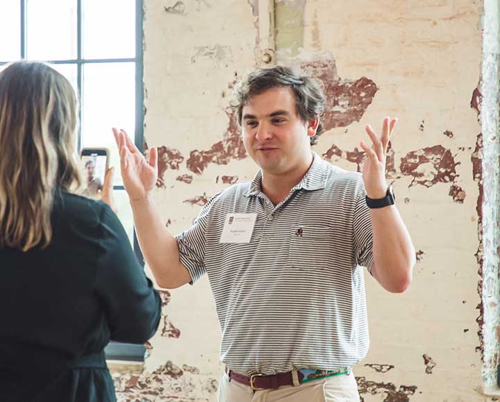 UGA Charleston Chapter President Stephen Scates records a video for Instagram.