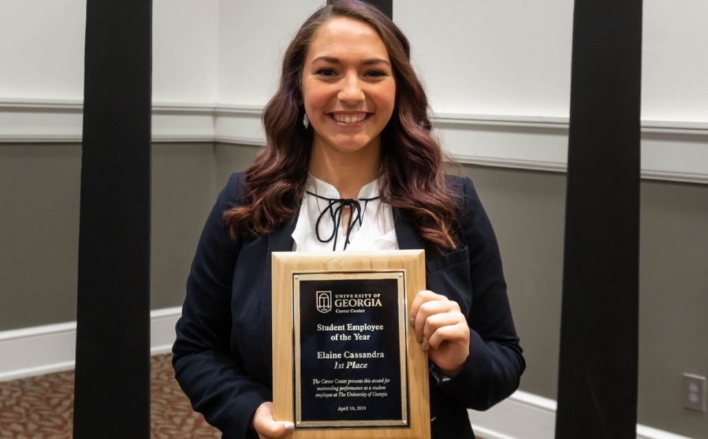 Elaine Cassandra with Student of the Year Plaque