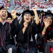 Graduating students celebrate during UGA’s spring 2023 commencement ceremonies at Sanford Stadium.