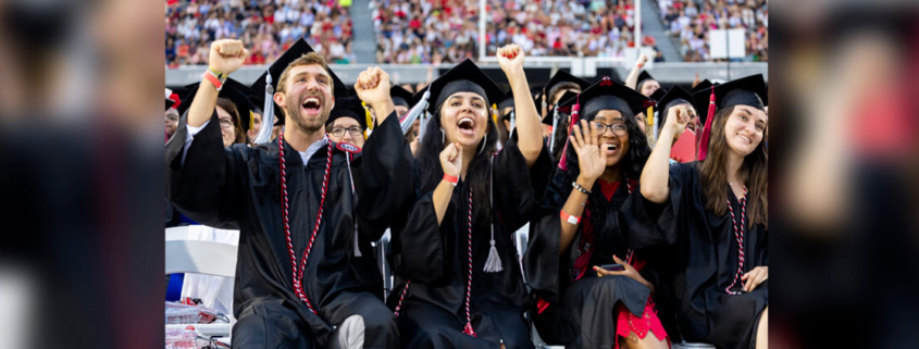 Graduating students celebrate during UGA’s spring 2023 commencement ceremonies at Sanford Stadium.