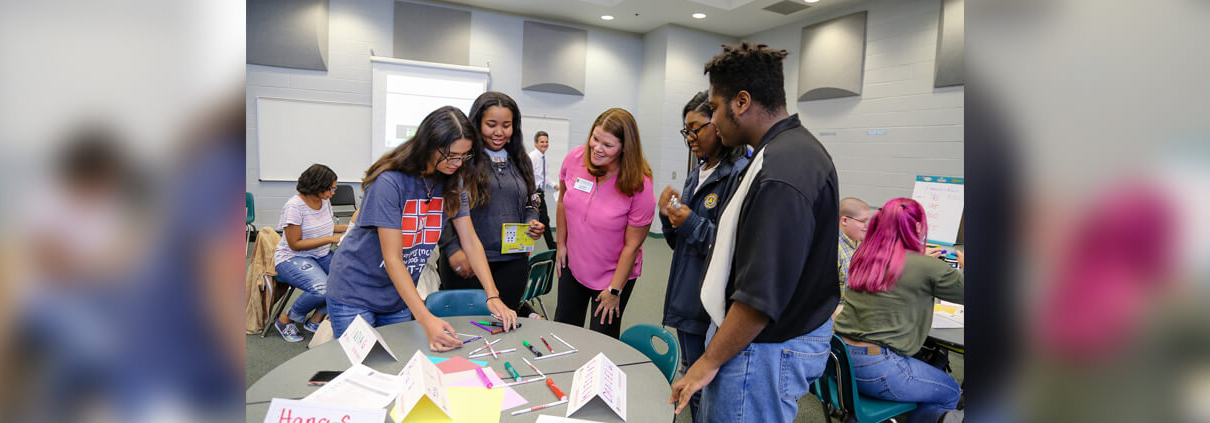 Students work with Lori Tiller and Lauren Healey, public service associates in UGA's Fanning Institute. (Photo by Shannah Montgomery)