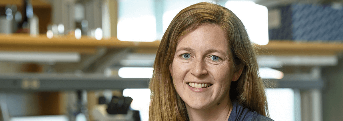 Dr. Erin Mordecai poses in lab.