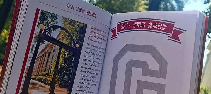 G Book in front of the Arch on UGA's North Campus.