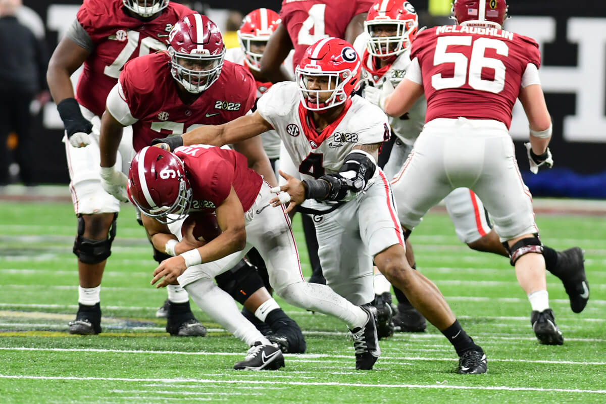 Nolan Smith sacks Alabama's Bryce Young during the 2022 CFP National Championship