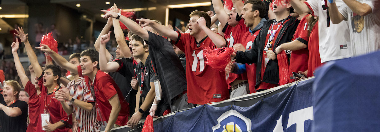 UGA fans in red and black cheer
