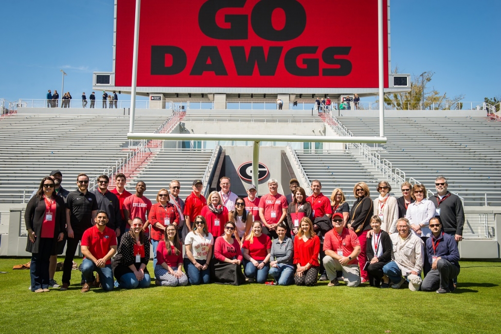 Sanford-Stadium-Group-Pic-on-Field