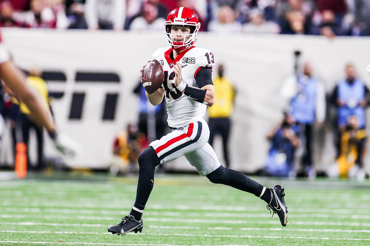 Stetson Bennett scrambles during a play during the 2022 CFP National Championship