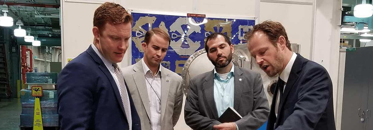 Kyle Wiley (second from left) tours Argonne National Laboratory in Lemont, Illinois.