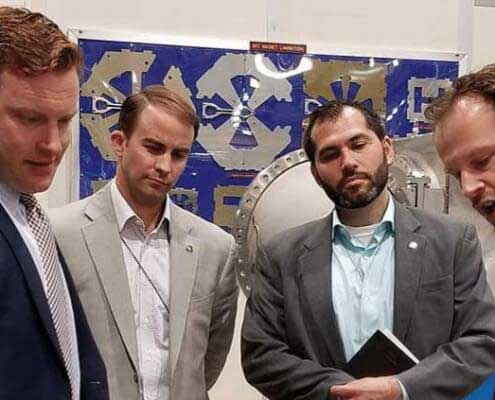 Kyle Wiley (second from left) tours Argonne National Laboratory in Lemont, Illinois.