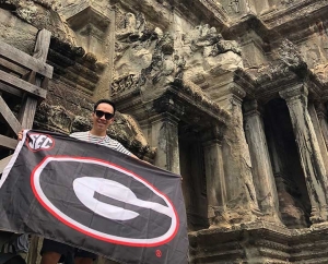 Dr. Vy Do (BS '10) celebrated his 30th birthday at Angkor Wat in Siem Reap, Cambodia and brought his UGA pride with him.