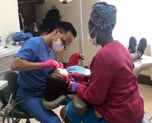 Dr. Vy Do (BS '10) volunteering this time and talents in Kikiyu, Kenya.