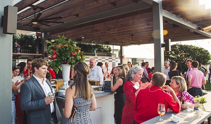 UGA Alumni and friends gather on Perry Lane Hotel rooftop.